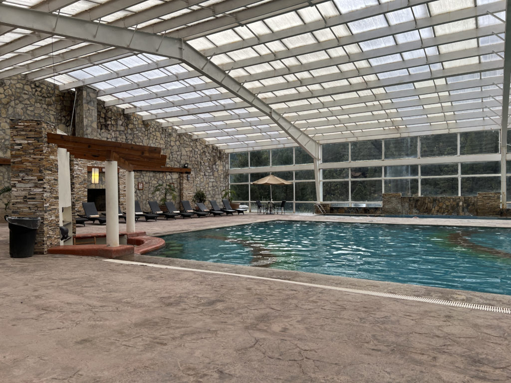 The pool at Bosques de Monterreal is beautiful and spacious. There's plenty of room to swim and play, plus a hot tup and scenic view outside the window wall.